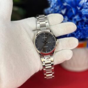 Calibre 5 automatic watch Pakistan front view Racing style automatic watch side angle Calibre 5 automatic watch Pakistan dial closeup Calibre 5 automatic watch with packaging box